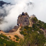 The Pico Ruivo lookout offers a fabulous and unobstructed view over the neighboring peaks except when a layer of clouds partially obscures the view.