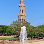 The Great Mosque of Sultan Qaboos is surrounded by stunning, well-kept flower gardens and water pools.