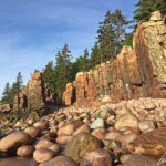 Over centuries, this coastline has been continually sculpted by the ocean: large granite rocks tumble down, transforming many creeks into beautiful pebble beaches.