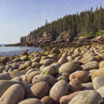The unofficially-named Boulder Beach is covered with thousands of sea-battered bowling ball-sized rocks.