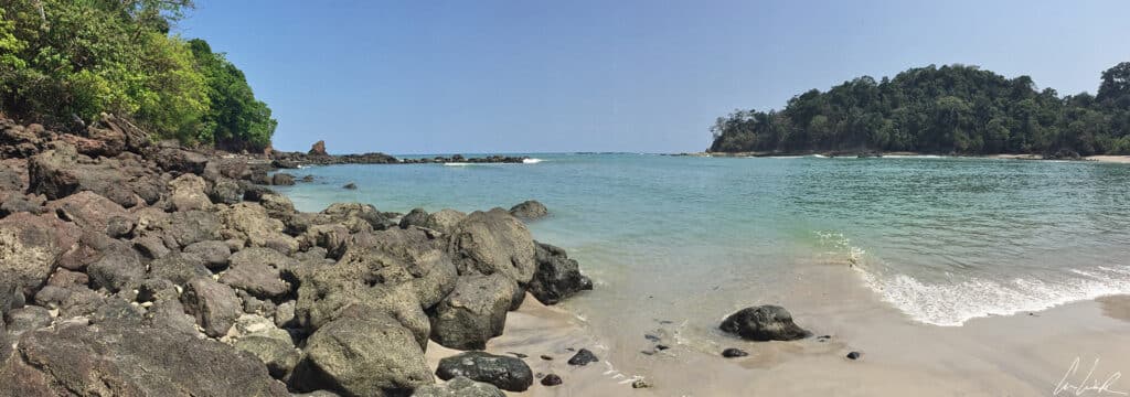 Playa Manuel Antonio, the most popular beach in the park is a cove with turquoise water and soft white sand, a tropical paradise.
